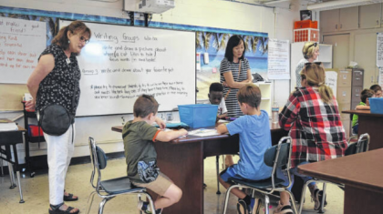 Julie Capaldi, left, in a class room at Camp iRock’s campus in Pickens at Pickens Elem.