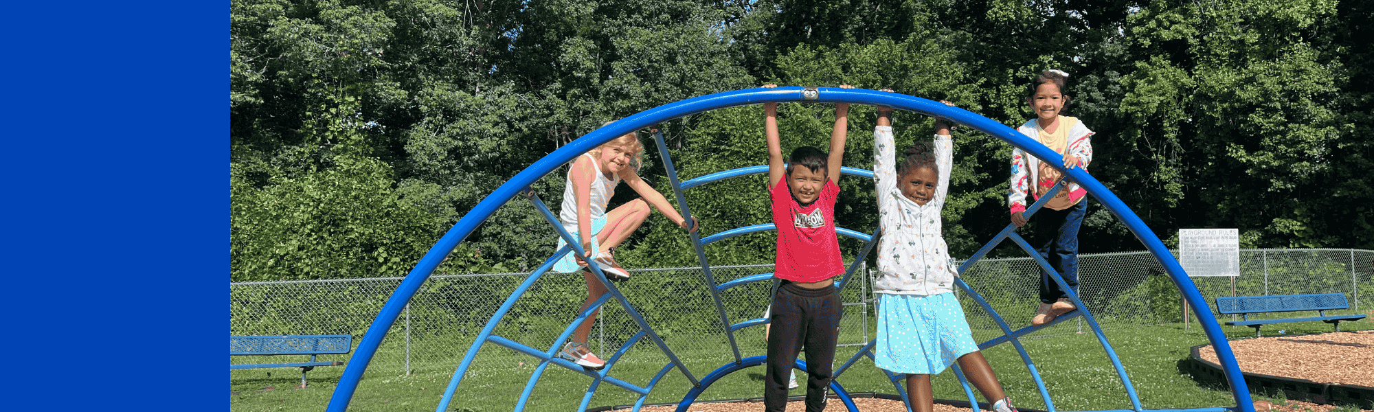 camp irock children hanging on the climber on the playground 2