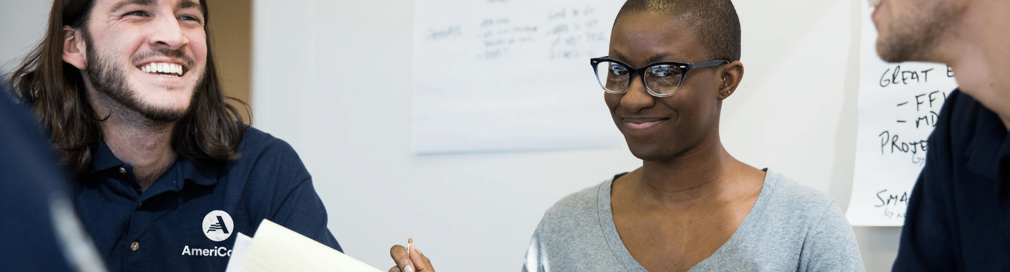 AmeriCorps Members in a conference room