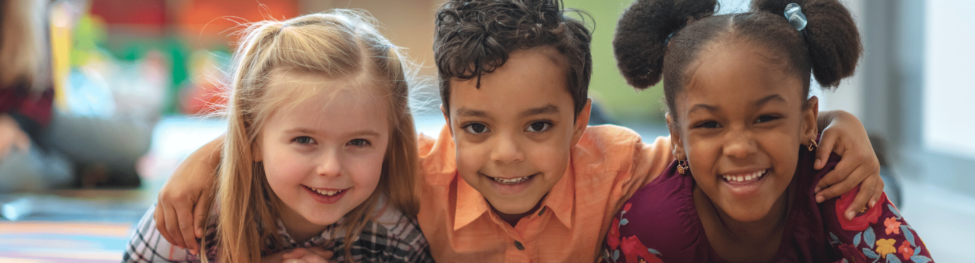 three smiling children