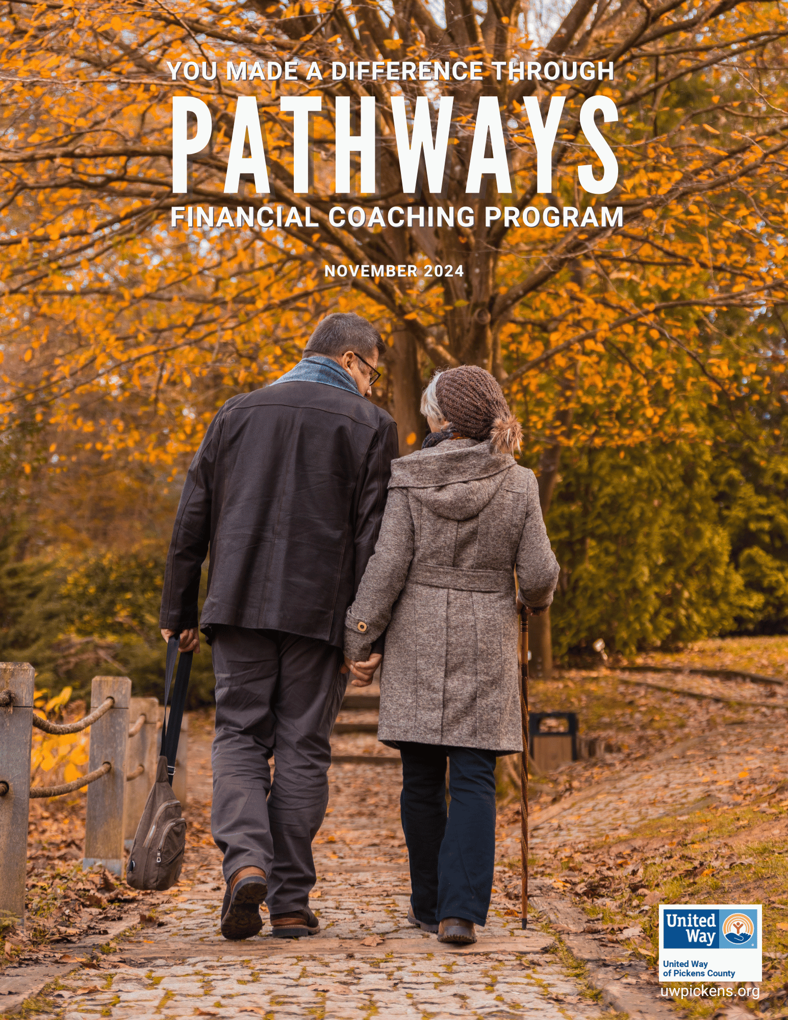 Pathways Impact Report cover showing a middle aged couple walking hand in hand down a path with fall leaves around them.