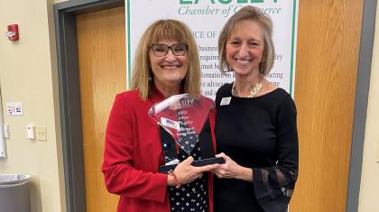 Julie Capaldi and Cindy Hopkins holding the Pillar of Easley award