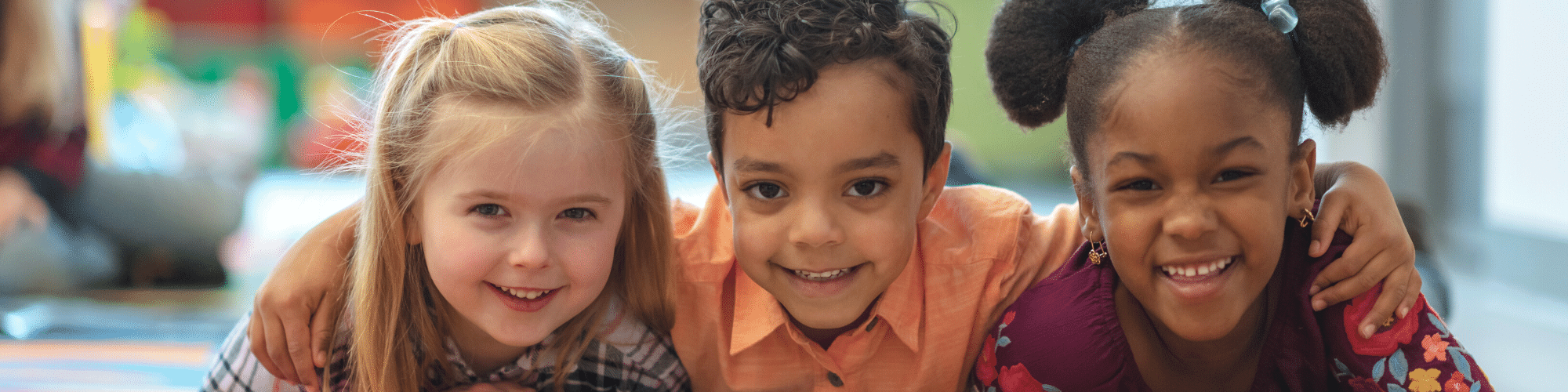 three smiling children